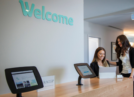 check in tablets at healthmint medical centre reception area